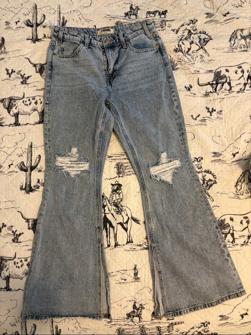 Light Blue Distressed Flare Jeans by Rock and Roll Denim